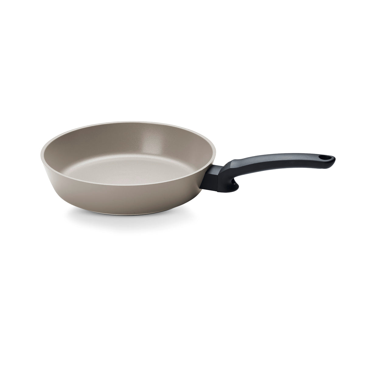 The Fissler Ceratal® Evo Comfort Pan features a beige ceramic finish and black handle—precision-made in Germany, on white background.