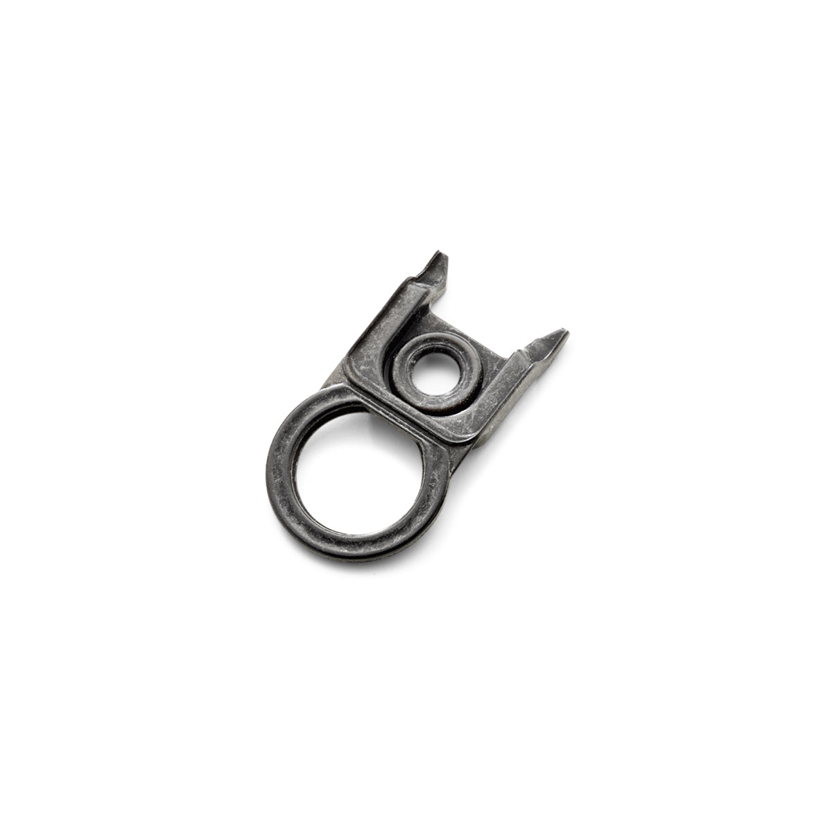 A precision metal tool with a round handle and two prongs, reminiscent of Fissler's modern, functional design, on a white background.