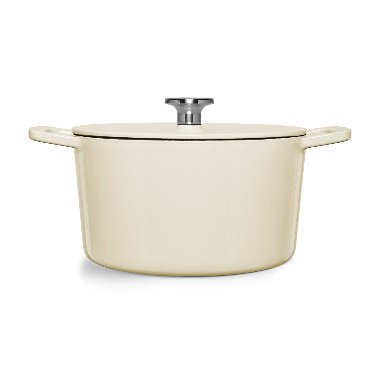 Fissler Moments cream-colored cast iron Dutch oven with lid and silver knob, iconic design for efficient cooking. Pictured on a white background.
