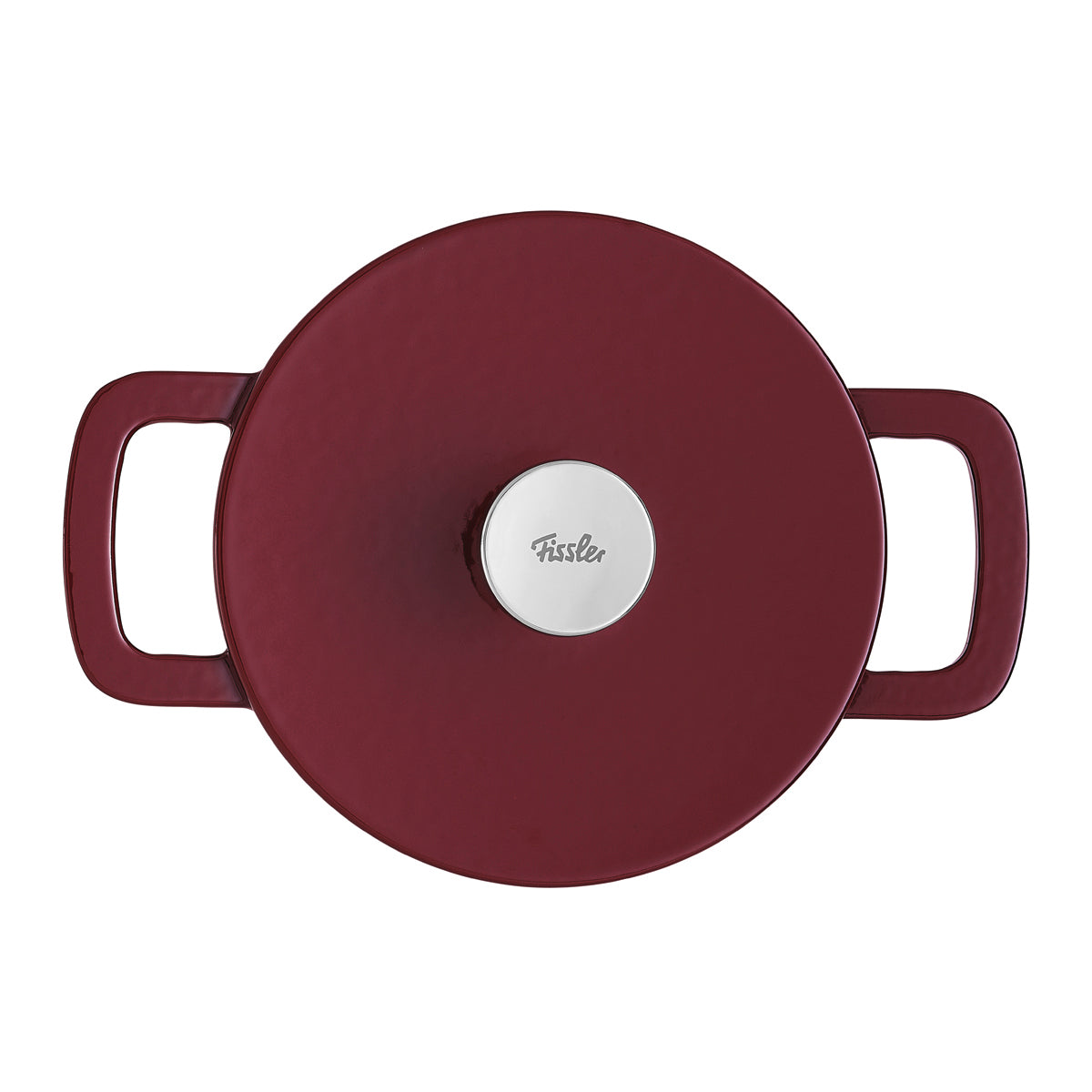 Top-down view of a deep red Fissler cast iron pot with handles and a silver knob, embodying German quality and timeless design.