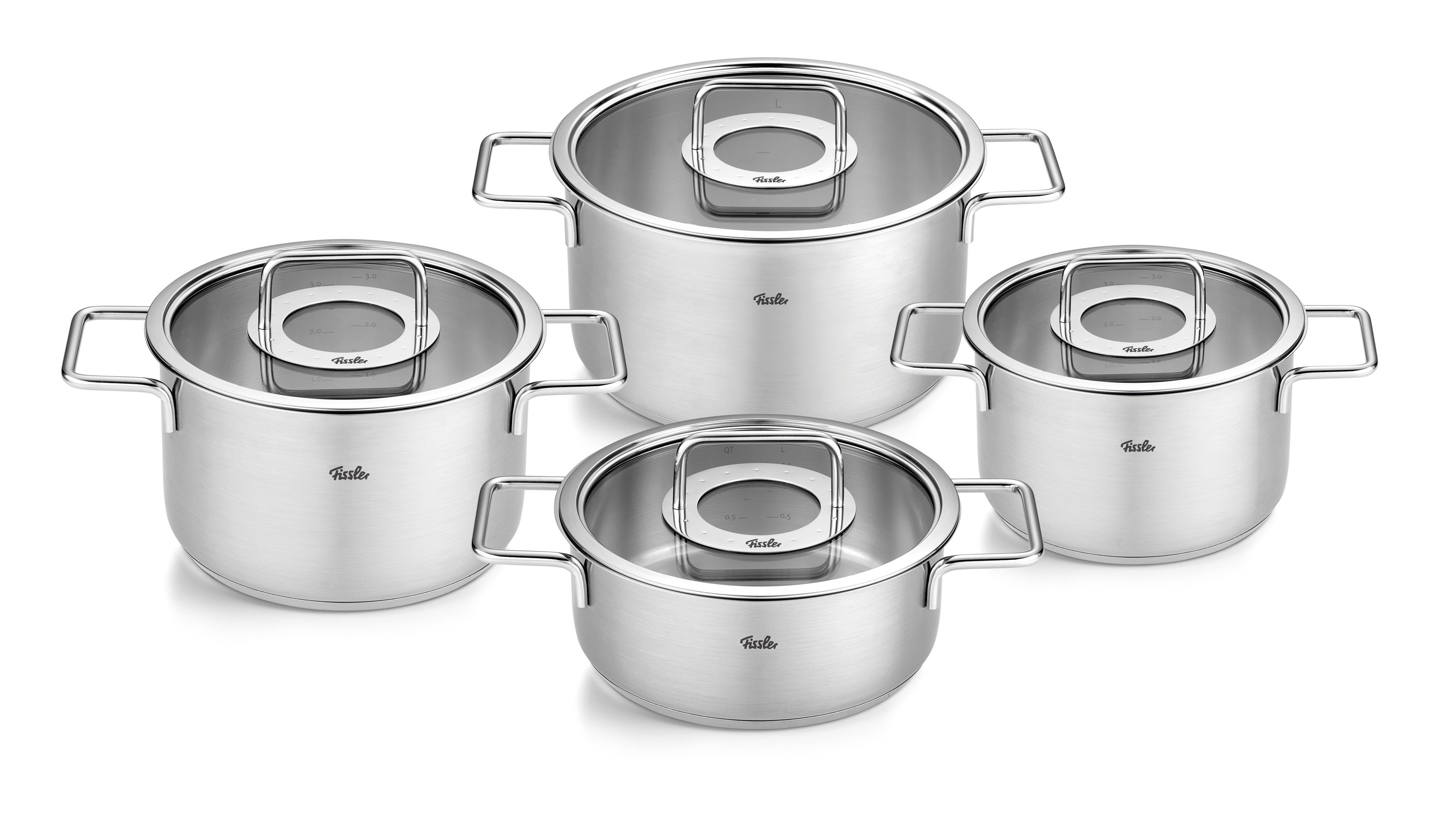 Fissler Pure Collection® 4-piece Cookware Set made of stainless steel with glass lids, precision-engineered, on a white background. Made in Germany.