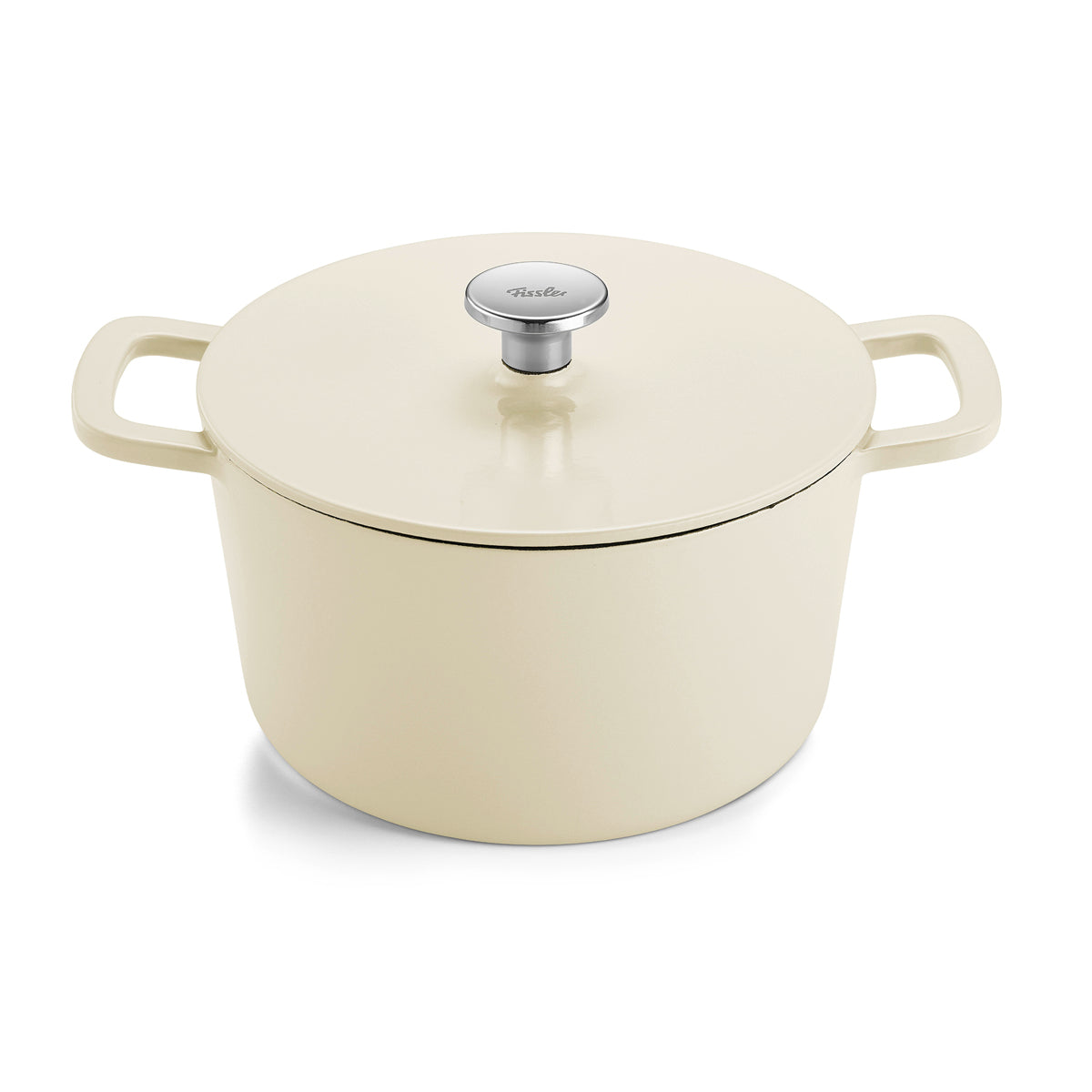 Cream-colored Fissler Moments cast iron Dutch oven with lid and wide handles. Metal knob on the lid with engraved Fissler lettering.