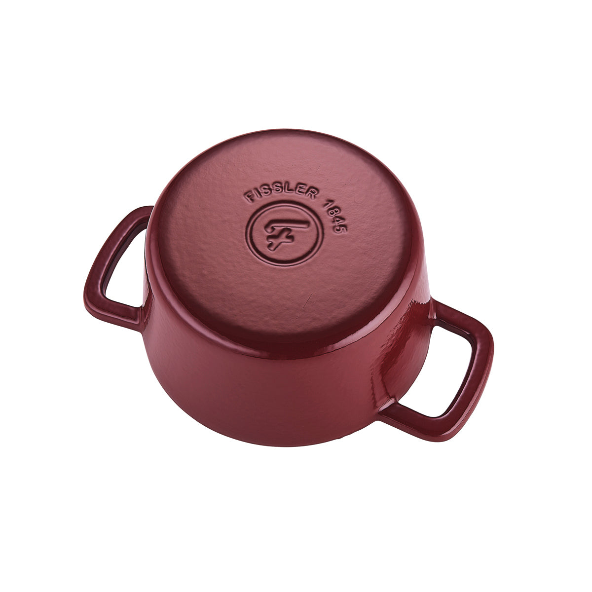 The inverted burgundy Fissler Moments cast iron pot features the 1845 logo and two side handles. Precision, durability - Made in Germany.