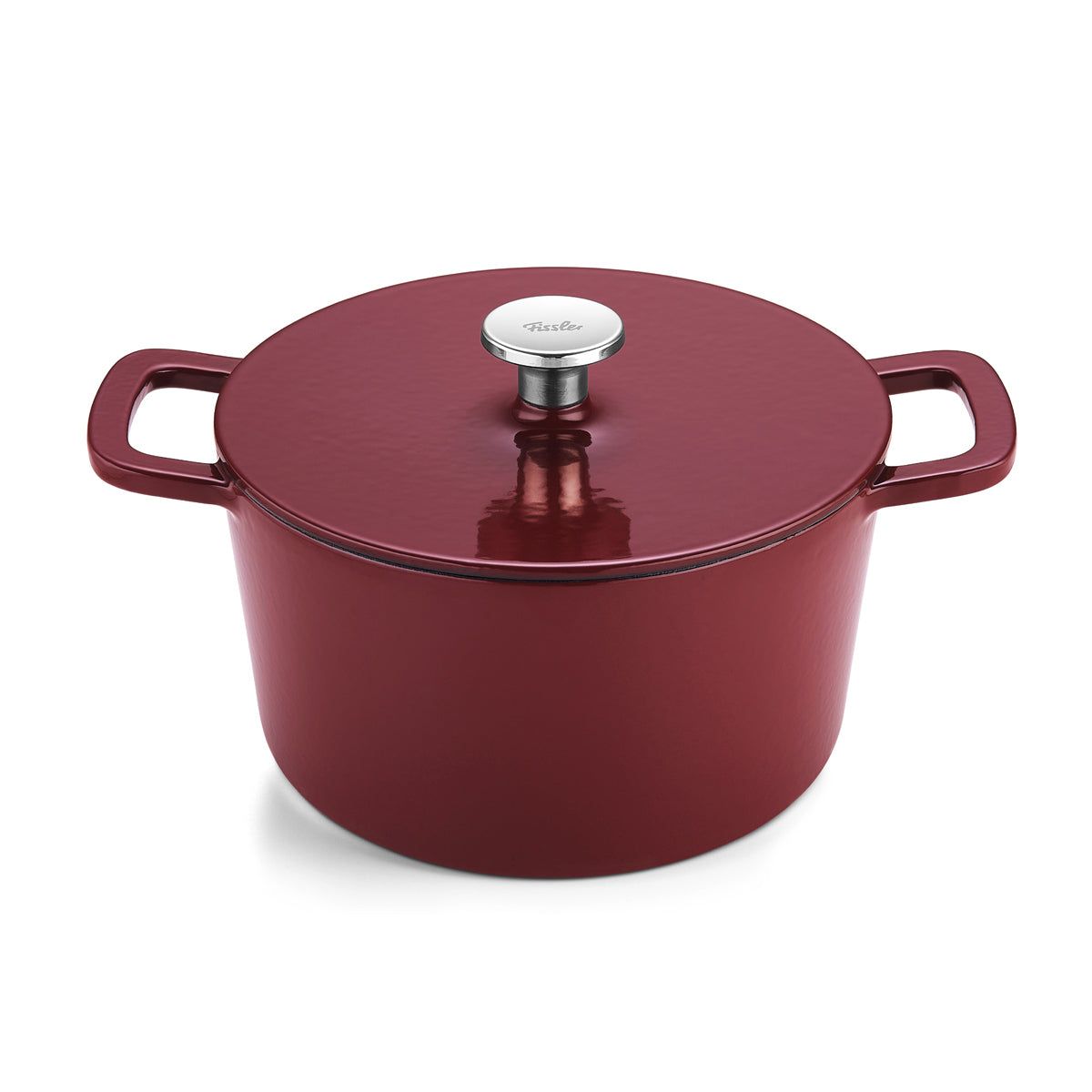Red Fissler Moments cast iron Dutch oven with lid and silver knob, precision-made in Germany, shown on a white background.