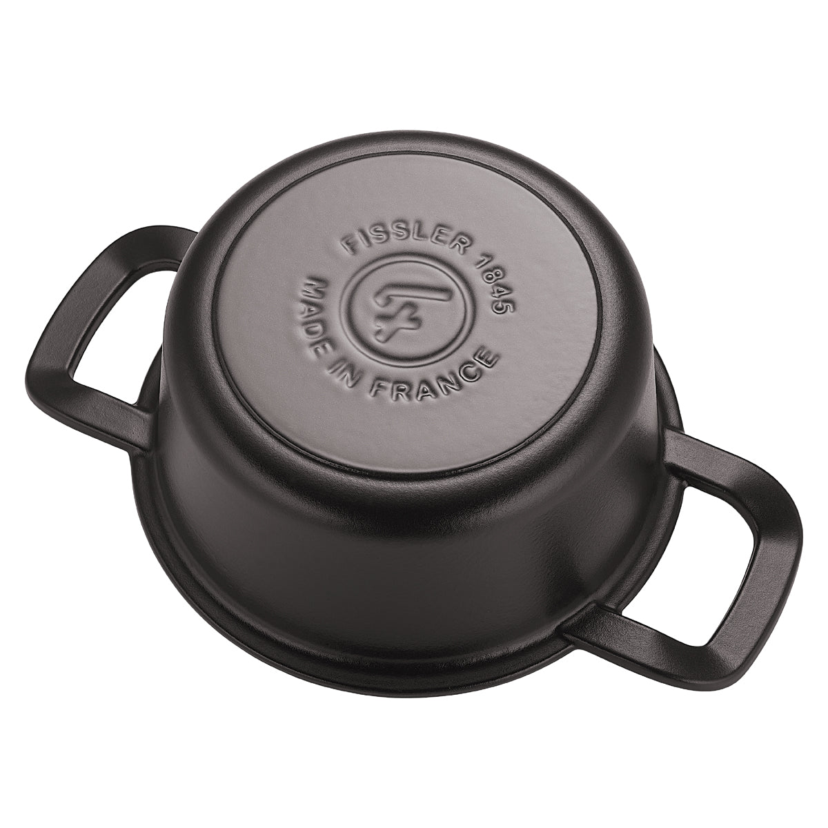 A black Fissler cast iron pot from the Original-Profi Collection®, upside down, with two handles, bottom stamped Fissler 1845.