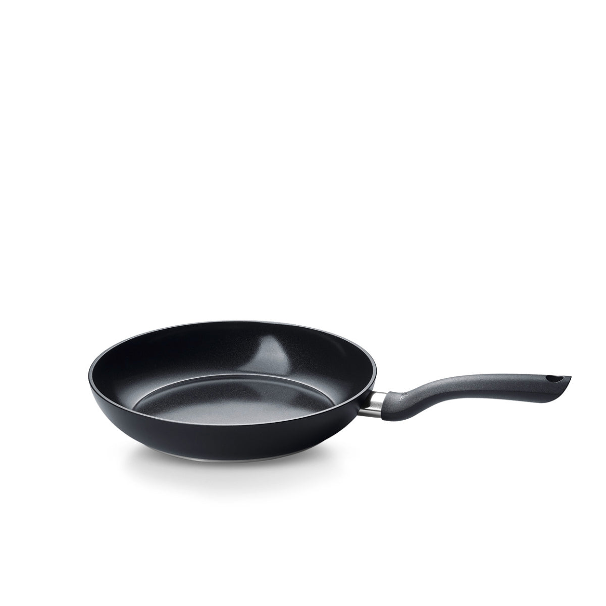 The Fissler Essential® Frying Pan in black, PFAS/PTFE-free, with a curved handle. Modern German design, precision-made since 1845.