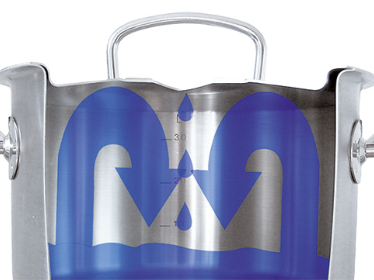 A cutaway of a Fissler stainless steel pot shows precise water circulation, steam condensation, and lid construction for optimal cooking.